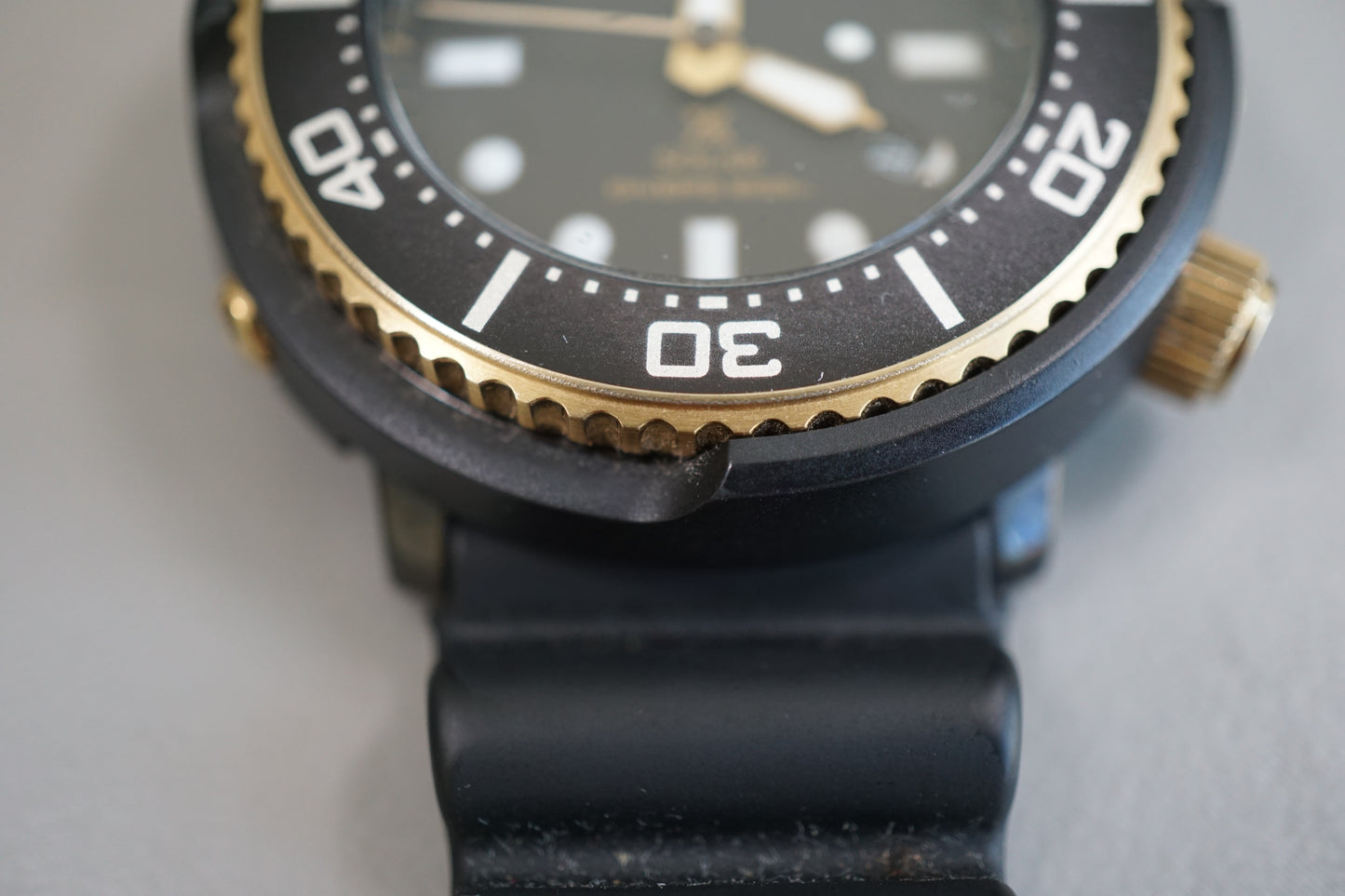 Seiko Prospex SBDN028 V147 Lowercase Black Dial Gold Tuna Solar Quartz Watch