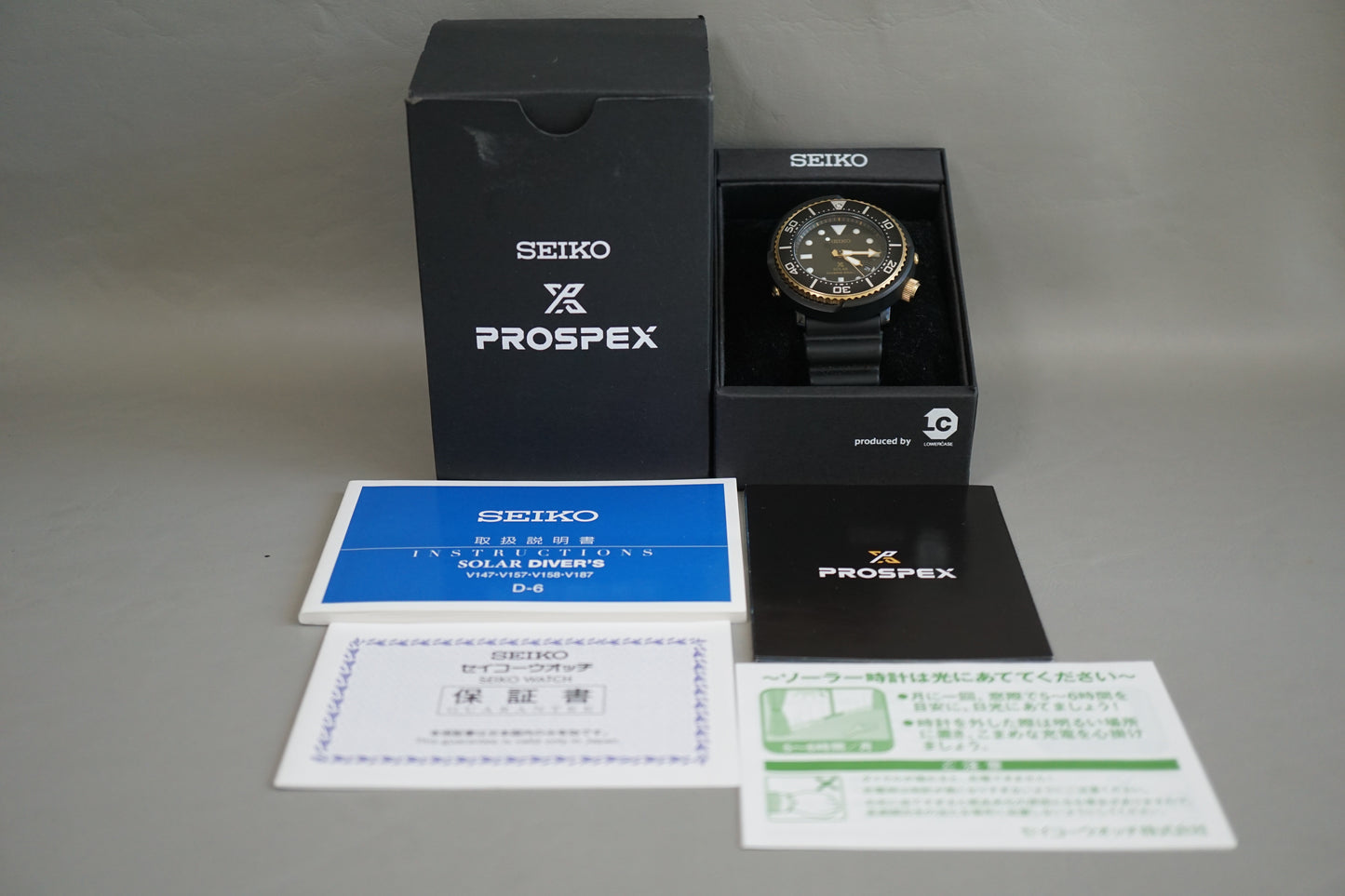 Seiko Prospex SBDN028 V147 Lowercase Black Dial Gold Tuna Solar Quartz Watch