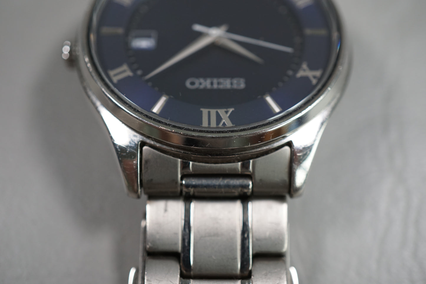 Seiko Selection SBPX115 V157 Titanium Roman Numeral Blue Dial Solar Quartz Watch