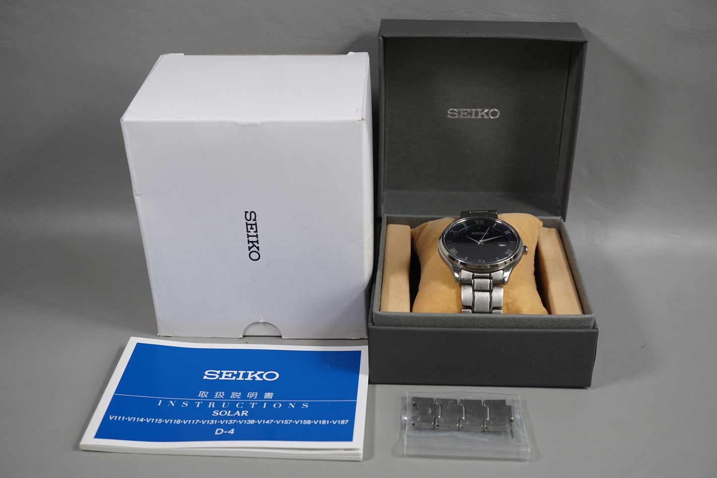 Seiko Selection SBPX115 V157 Titanium Roman Numeral Blue Dial Solar Quartz Watch