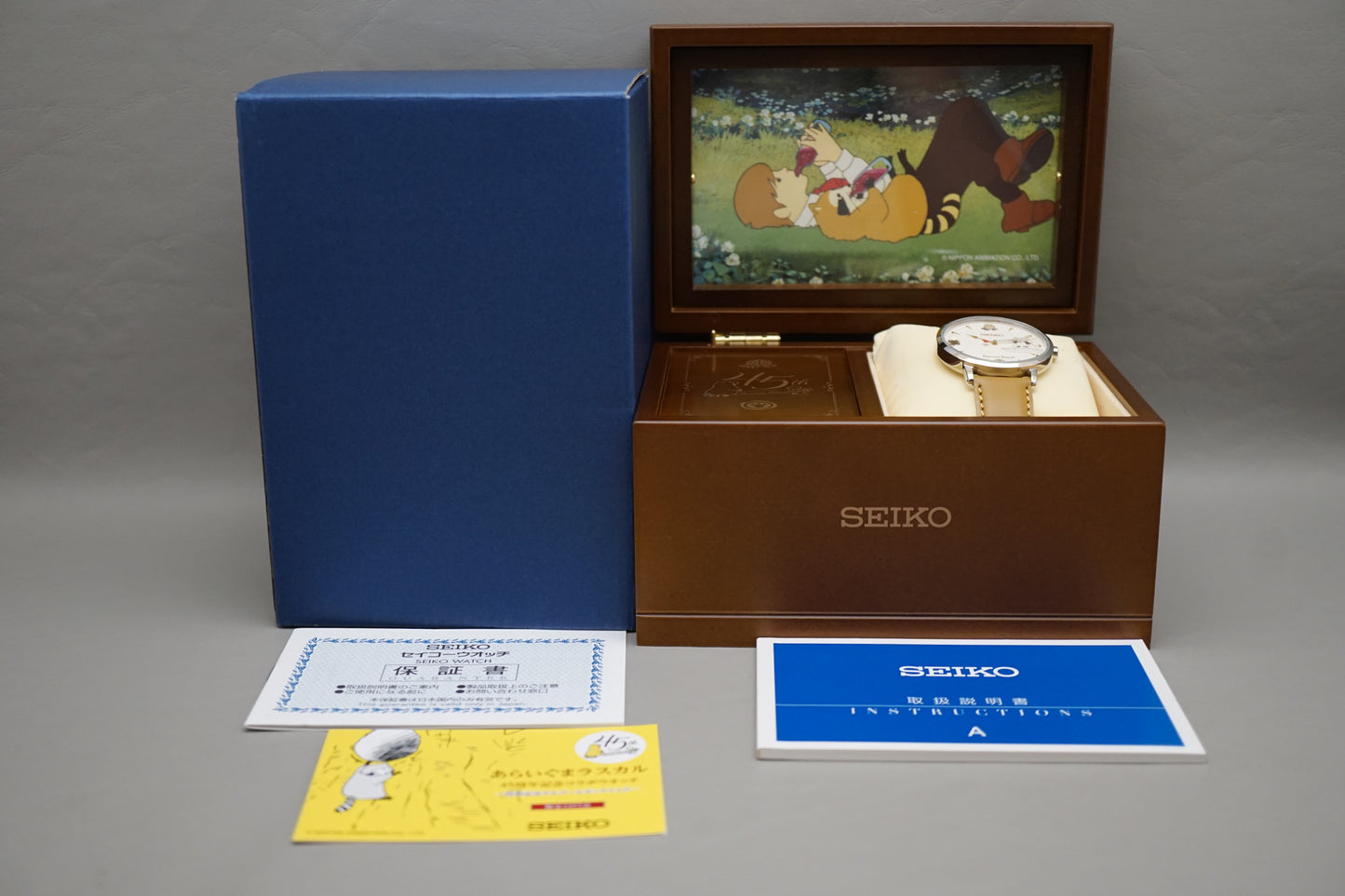 Seiko 7N01-HDT0 Raccoon Rascal 45th Anniversary Quartz Watch With Music Box