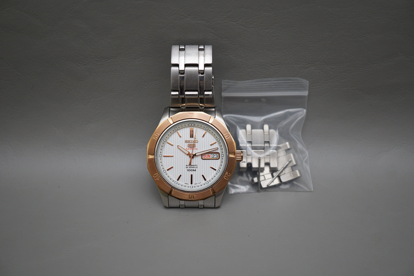 Seiko 5 Sports SRP292 4R36 Steel Rose Gold Tone White Dial Automatic Watch