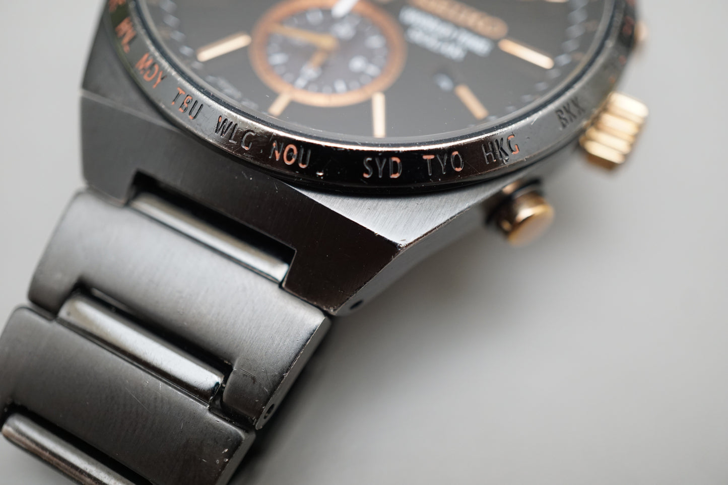 Seiko Spirit SBPJ039 V195 Black Rose Gold Tone World Time Solar Quartz Watch
