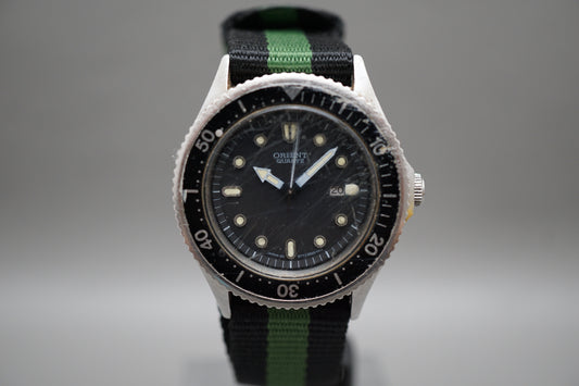 Vintage Orient H977302-00 Midsize 34mm Water Resistant Dive Style Quartz Watch