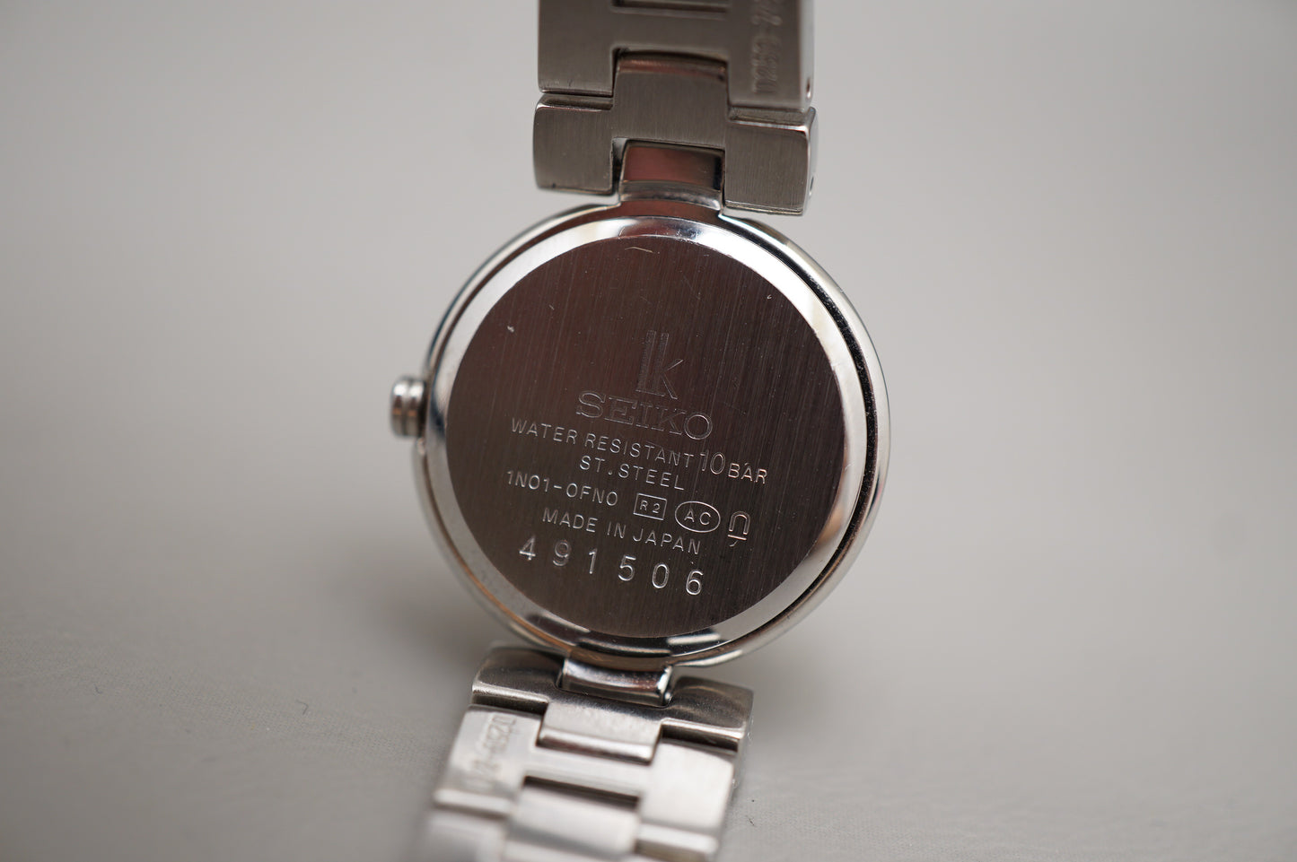 Seiko Pair Watch Set SBTM001 7B22 Titanium Solar SSVY053 Stainless Quartz Watch