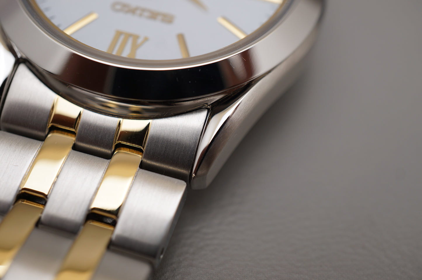 Seiko Selection SBPX085 V158 Gold Two Tone White Dial Solar Quartz Watch