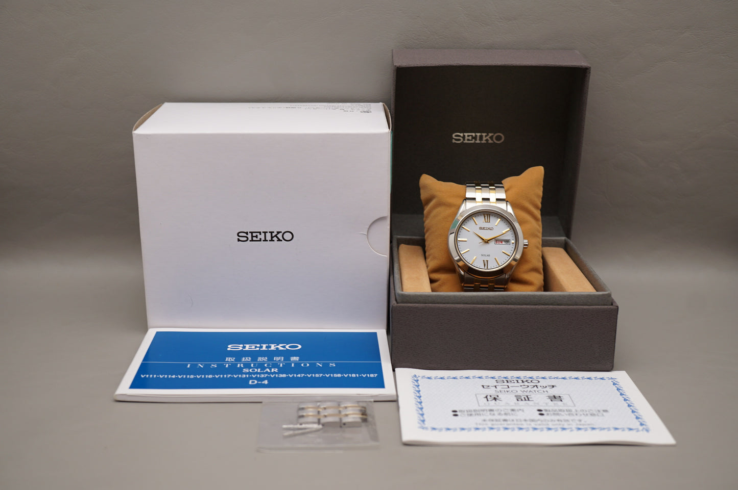 Seiko Selection SBPX085 V158 Gold Two Tone White Dial Solar Quartz Watch