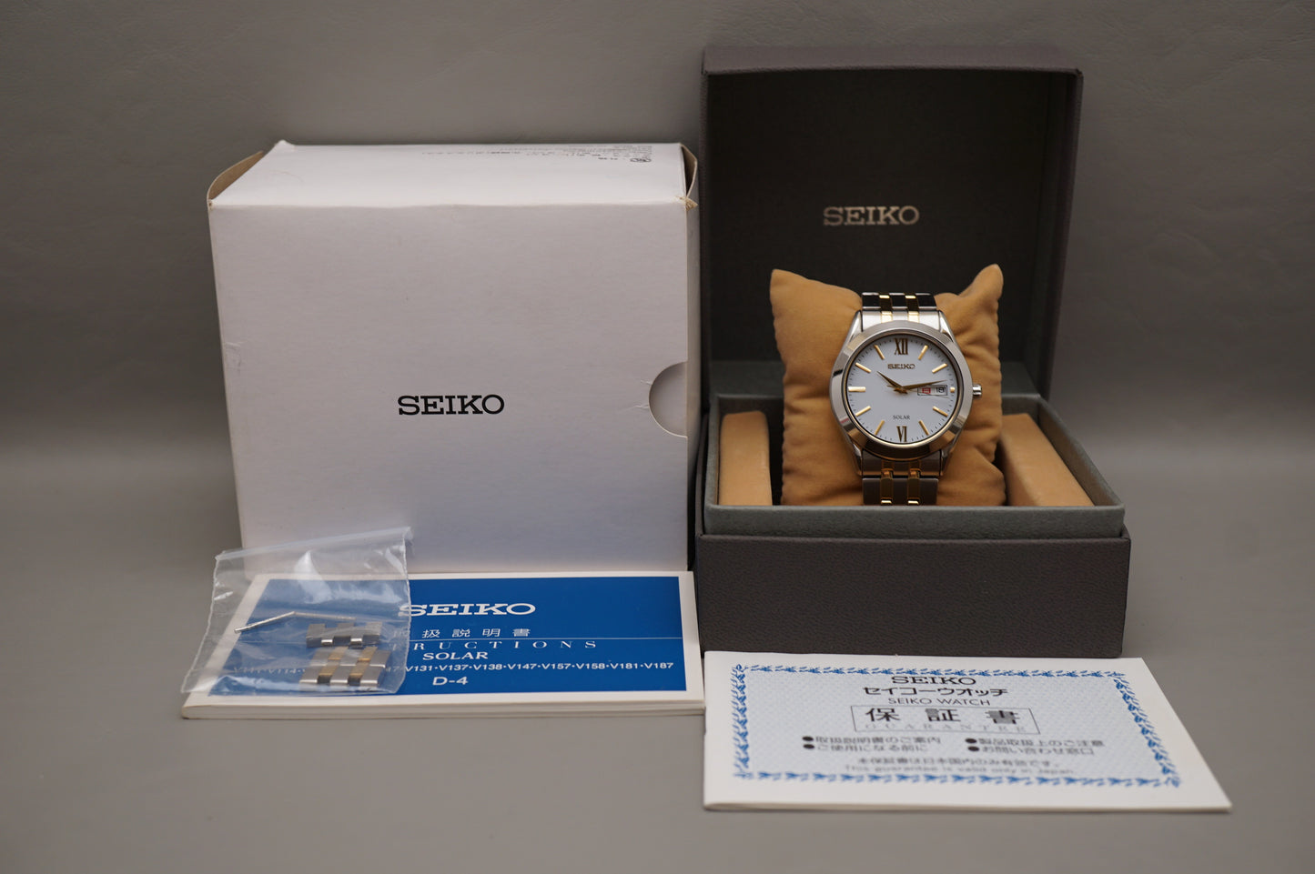 Seiko Selection SBPX085 V158 Gold Two Tone White Dial Solar Quartz Watch