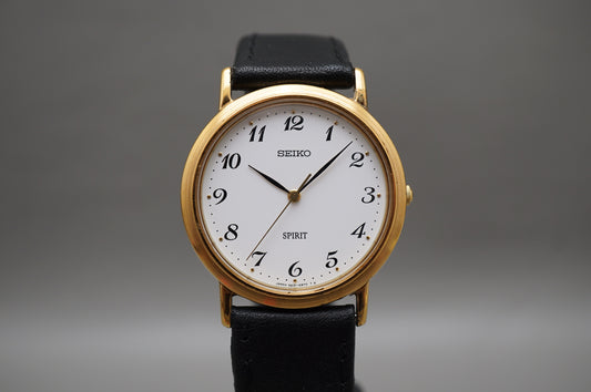 Seiko Spirit 5E21-6000 Gold Tone White Dial Quartz Watch