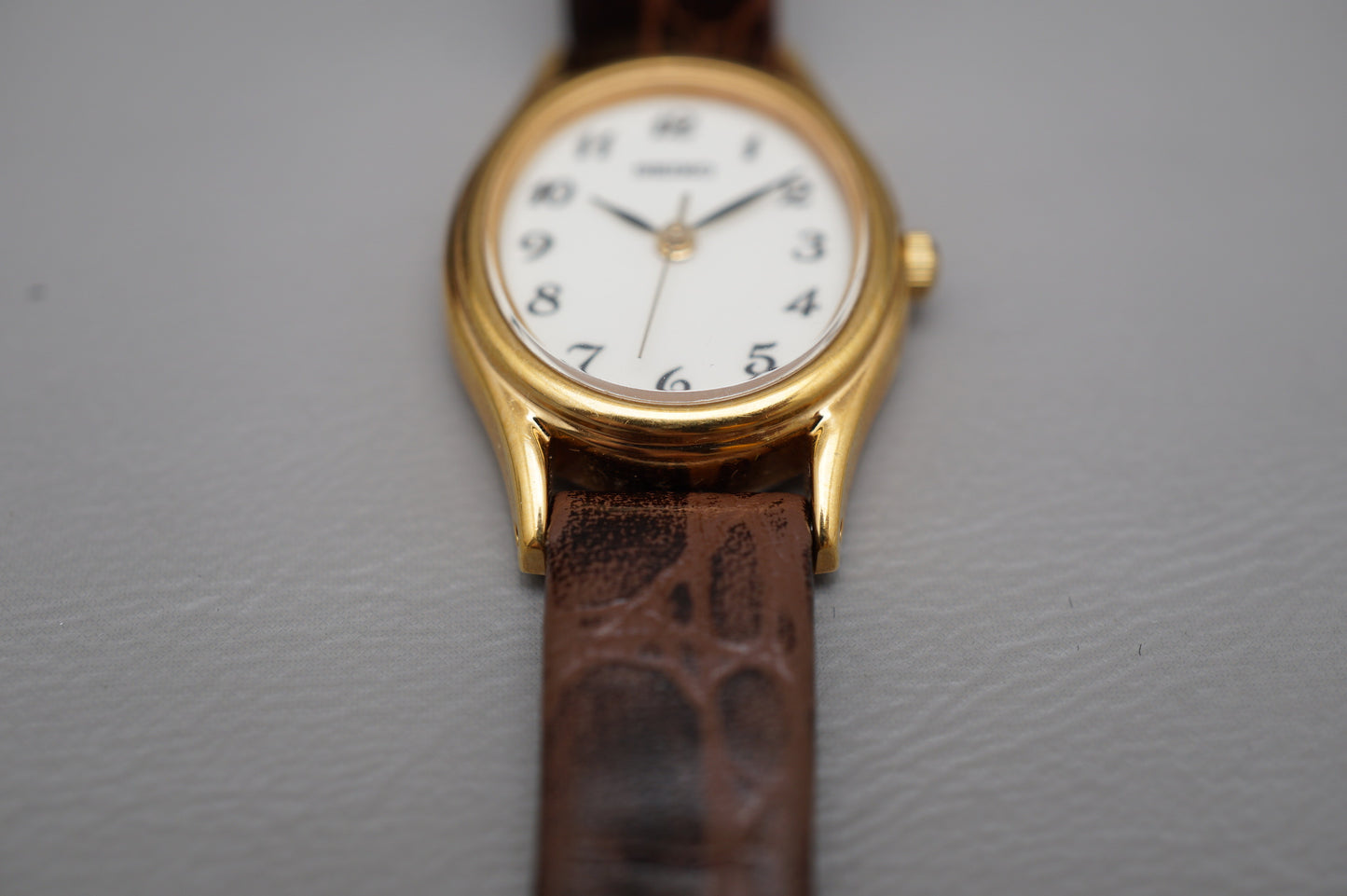 Seiko Spirit SSDA006 1N01 Gold Tone White Dial Oval Case Quartz Ladies Watch