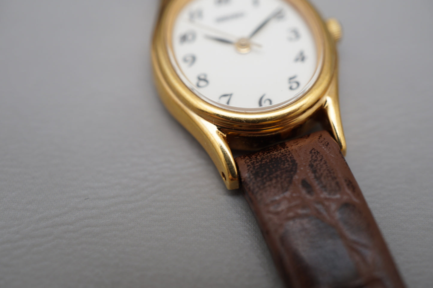 Seiko Spirit SSDA006 1N01 Gold Tone White Dial Oval Case Quartz Ladies Watch