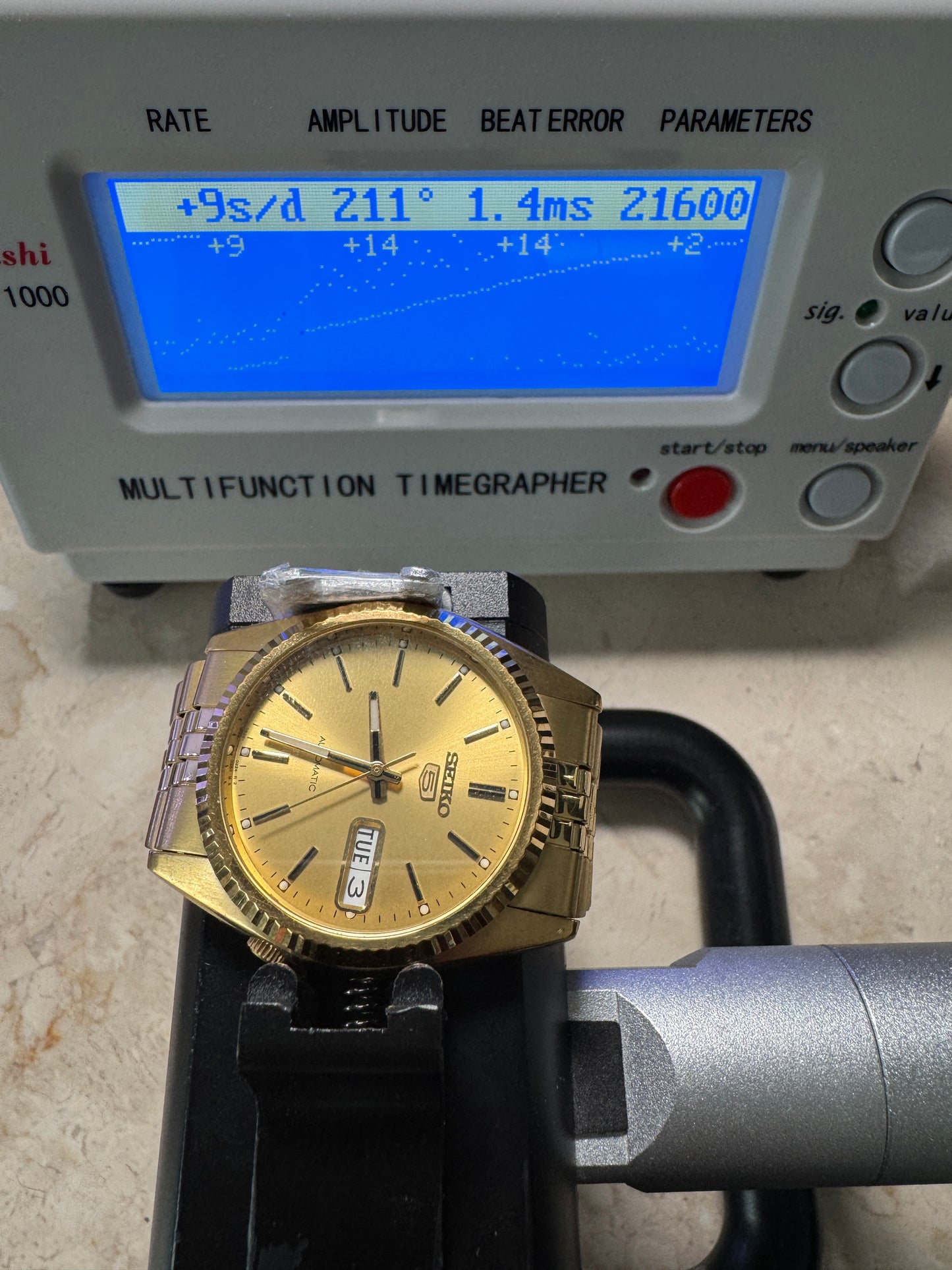 Seiko 5 Sports SNXJ94 7S26 Gold Tone Fluted Bezel Day Date Automatic Watch