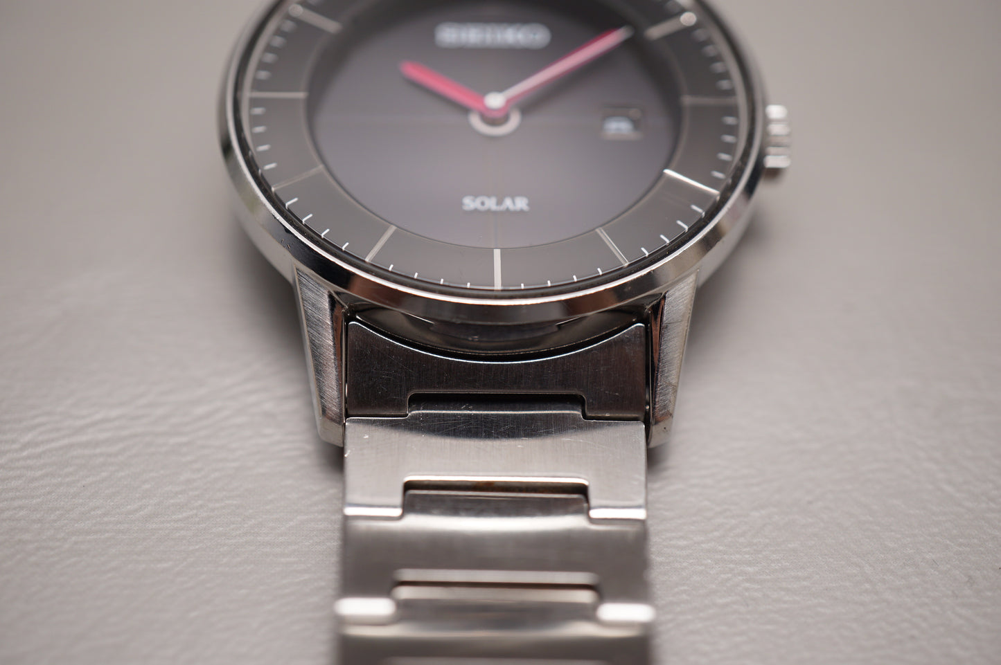 Seiko Spirit V147-0AK0 Black Dial Pink Hands Sector Dial Solar Quartz Watch