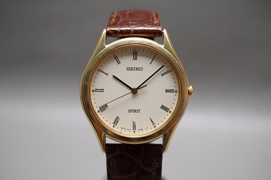 Vintage 1985 Seiko Spirit 5E21-6D70 Gold Tone Roman Dial Quartz Watch