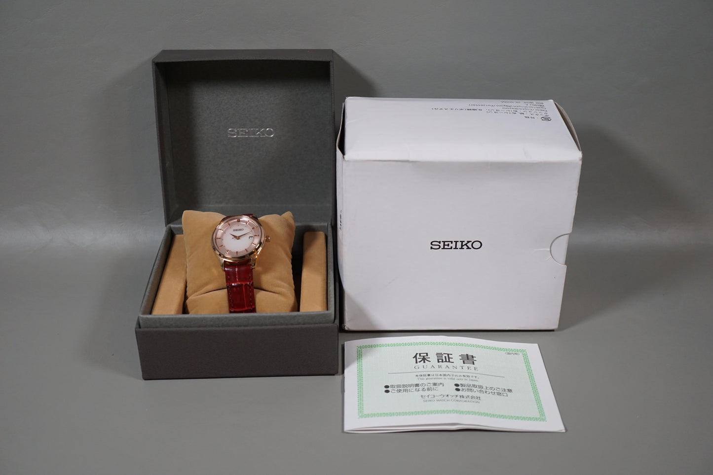 Seiko V137-0DJ0 V137 Gold Tone Titanium Solar Quartz Ladies Watch