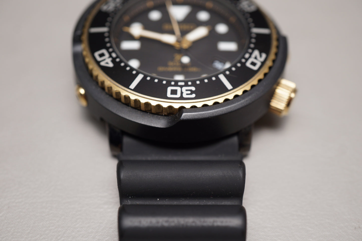 Seiko Prospex SBDN028 V147 Lowercase Limited Black Gold Tuna Solar Quartz Watch