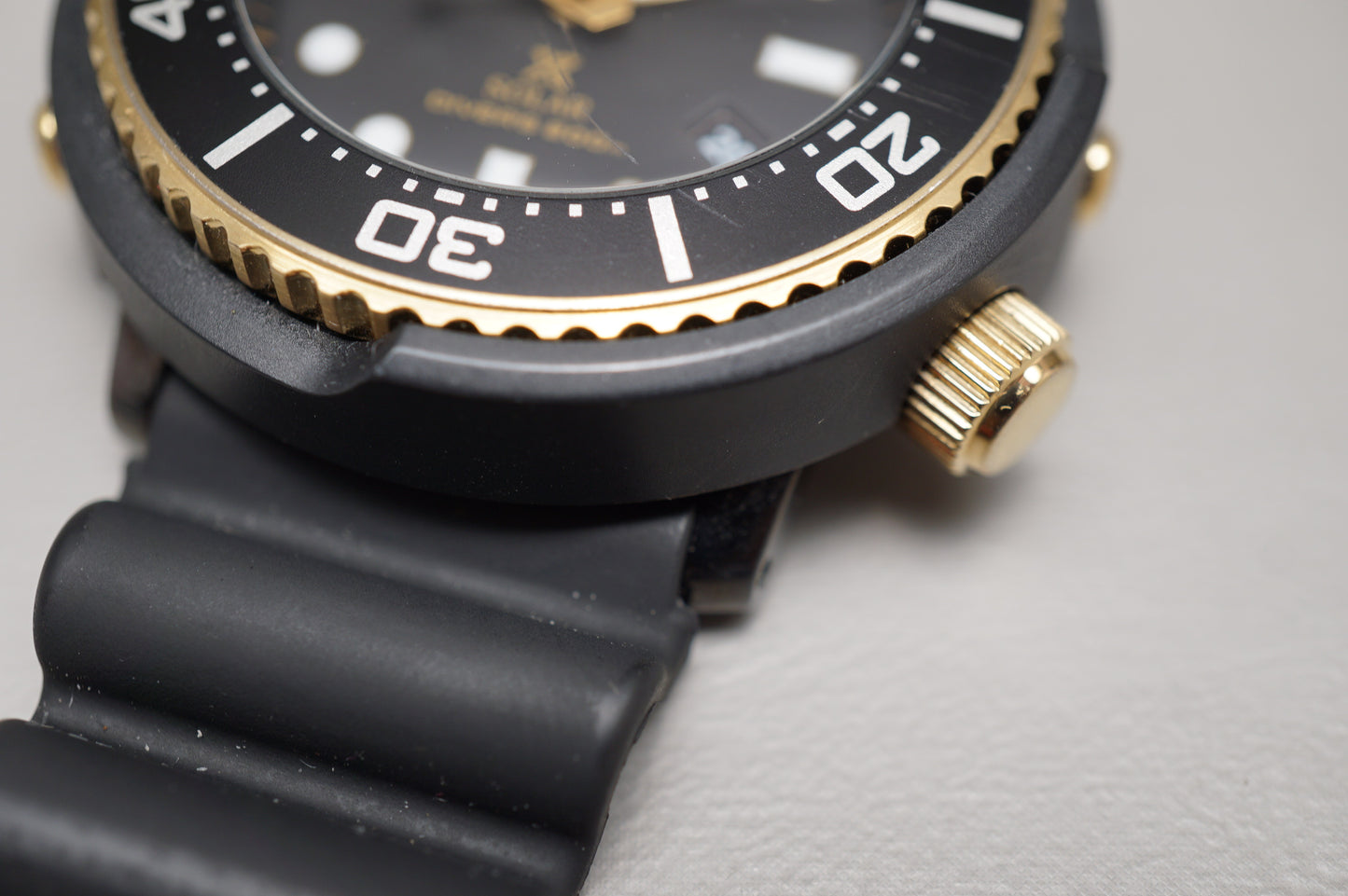 Seiko Prospex SBDN028 V147 Lowercase Limited Black Gold Tuna Solar Quartz Watch