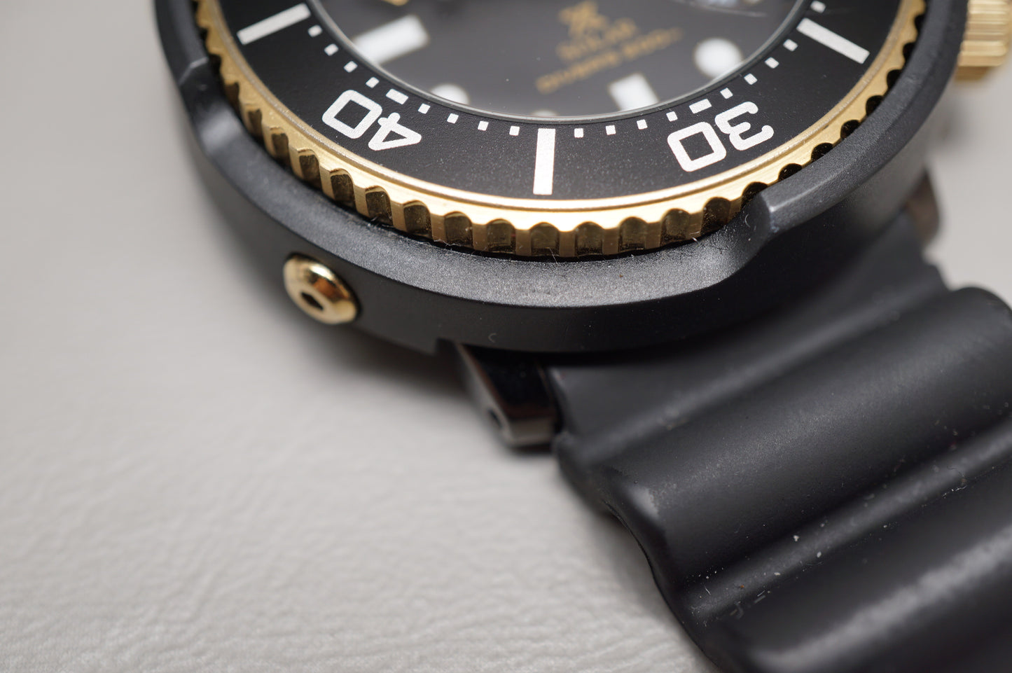 Seiko Prospex SBDN028 V147 Lowercase Limited Black Gold Tuna Solar Quartz Watch