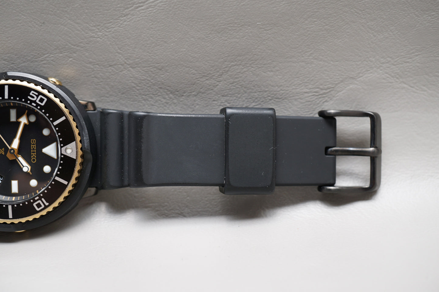 Seiko Prospex SBDN028 V147 Lowercase Limited Black Gold Tuna Solar Quartz Watch