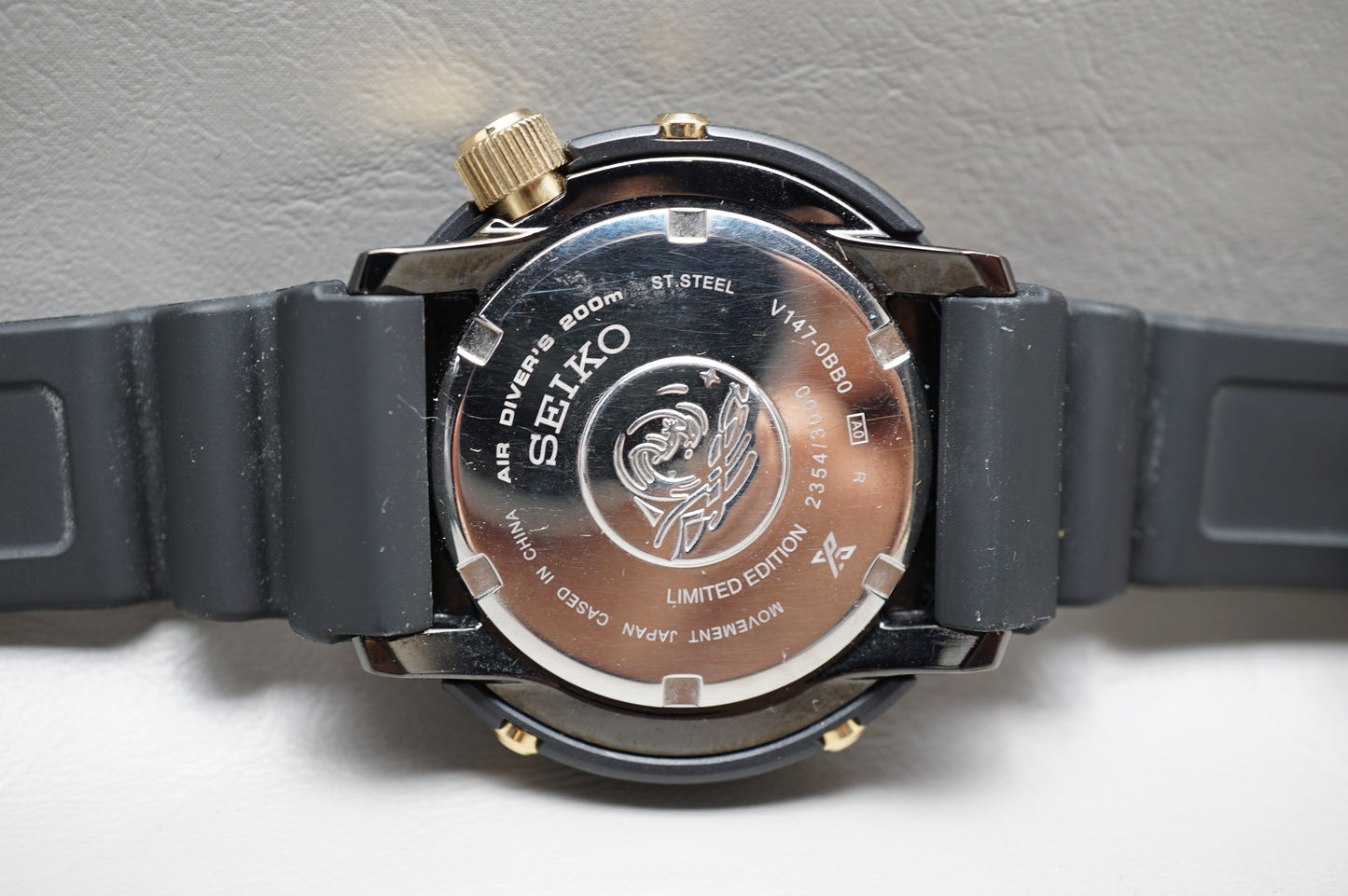 Seiko Prospex SBDN028 V147 Lowercase Limited Black Gold Tuna Solar Quartz Watch