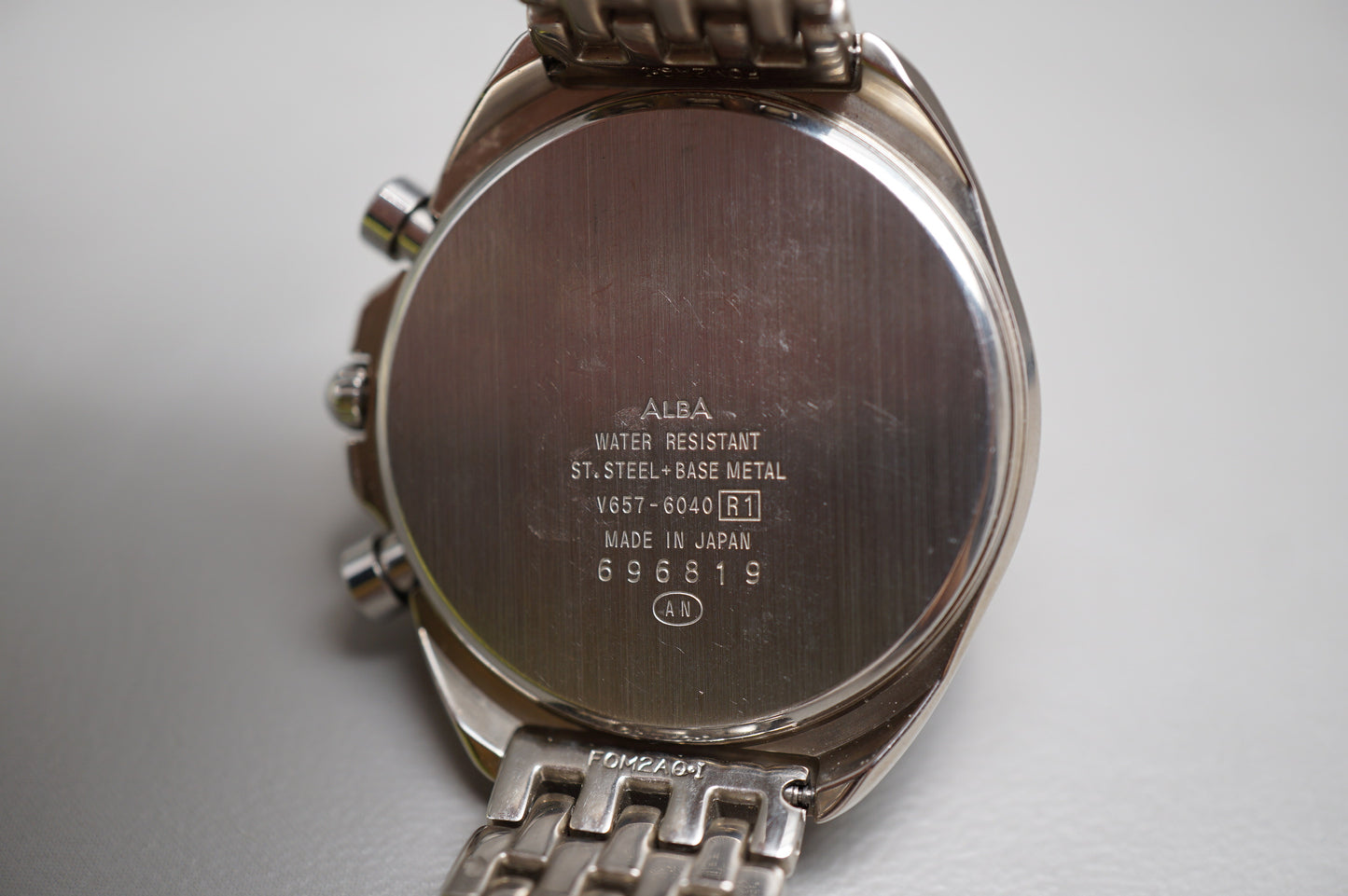 Vtinage Seiko Alba DEUA V657-6040 Orange Dial Quartz Chronograph Watch