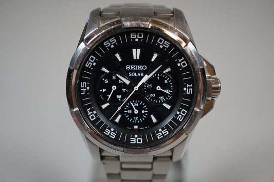 Seiko SNE015P1 V14J Day Date Black Dial Solar Quartz Watch