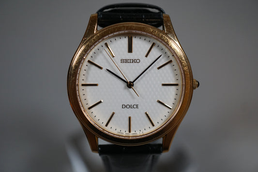 Seiko Dolce 5E61-0A90 Gold Tone Textured White Dial Quartz Watch