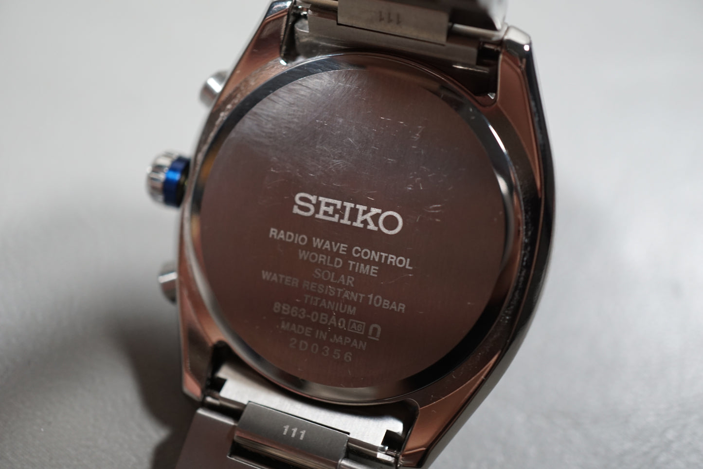 Seiko Astron SBXY013 8B63 Titanium Navy Dial Radio Wave Solar Quartz Watch