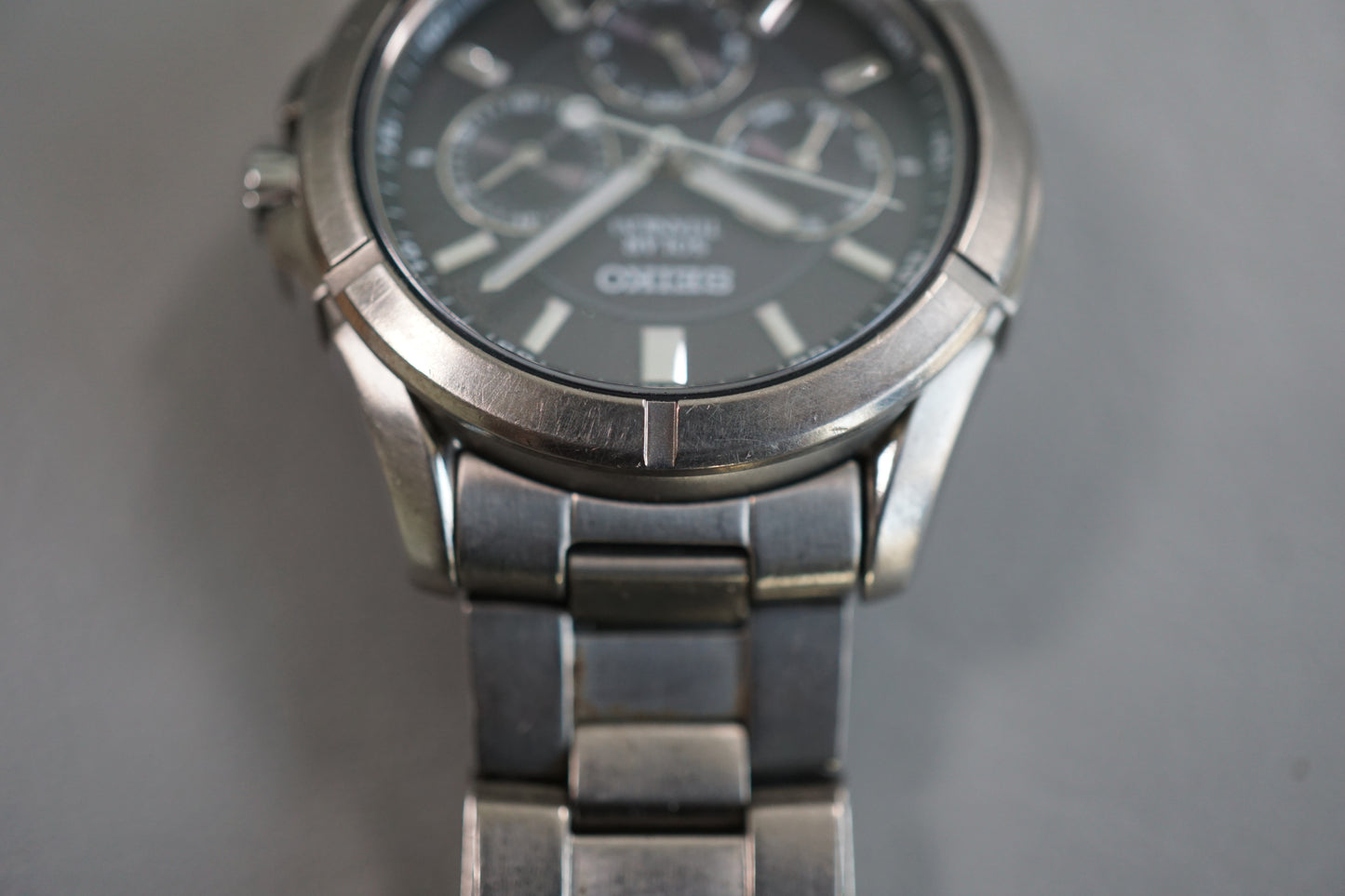 Seiko V14J-0AE0 Titanium Day Date Solar Quartz Watch