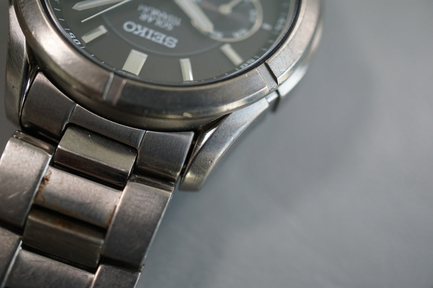 Seiko V14J-0AE0 Titanium Day Date Solar Quartz Watch