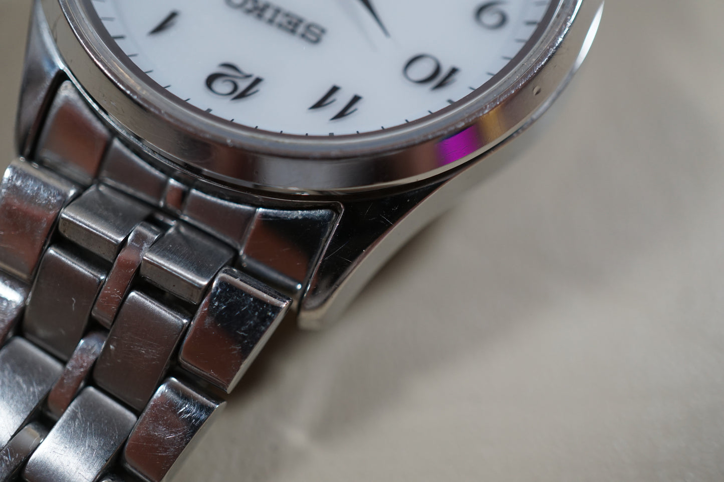 Seiko Spirit SBPX067 V158 White Dial Sapphire Solar Quartz