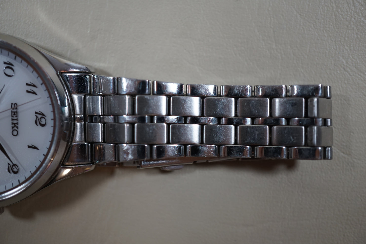 Seiko Spirit SBPX067 V158 White Dial Sapphire Solar Quartz